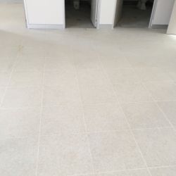 Luxury Vinyl Tile in Premium Limestone Finish with White Grout